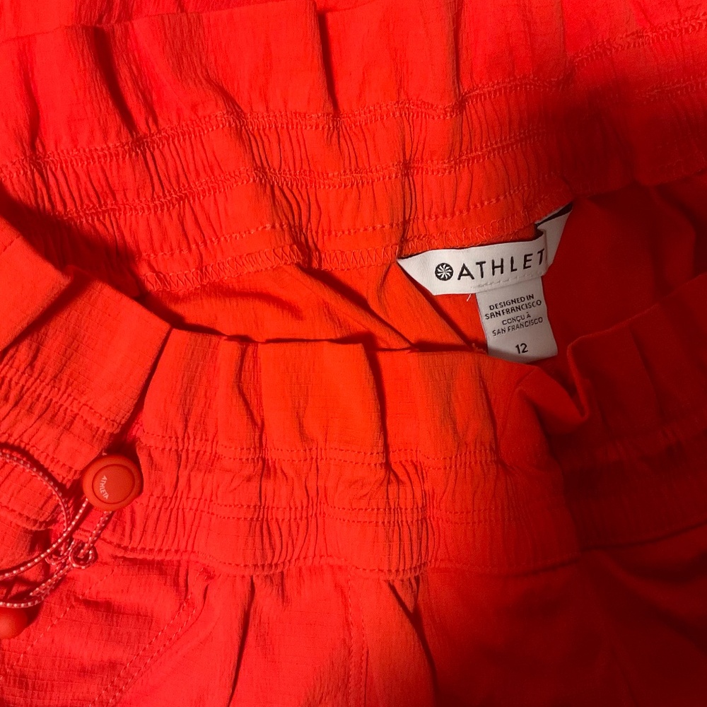 Athleta coral red track pant In size 12